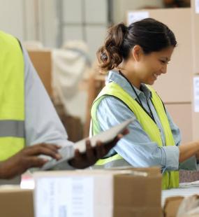 Woman working working in distribution centre