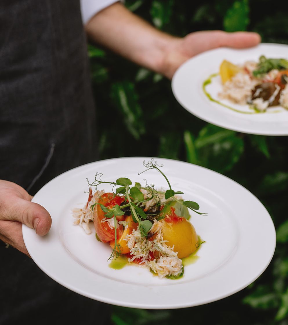 plates of food being carried