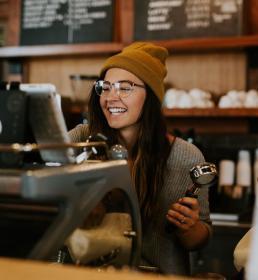 barista working in a coffee shop