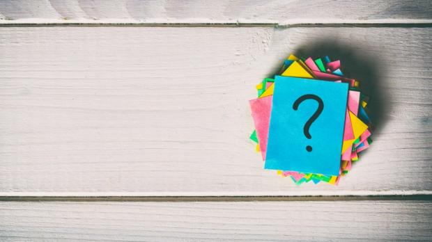 post-it notes on wood background