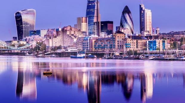 city of london in evening purple sky 