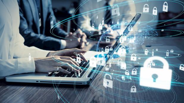 cyber graphic on laptops