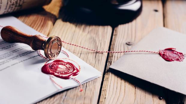 Notary public wax stamper and documents