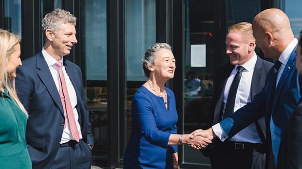 Group of business people shaking hands
