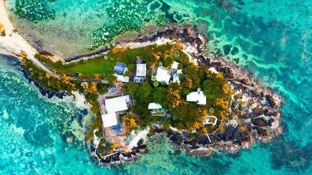 Overhead shot of small tropical island,  Grand Baie, Mauritius  