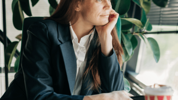 Lady staring out of window