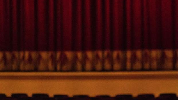 Lights down in a theatre