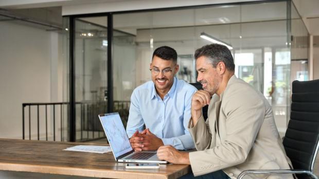 two men in casual wear having a meeting 