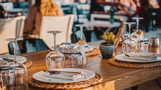 dining table set with wine glasses