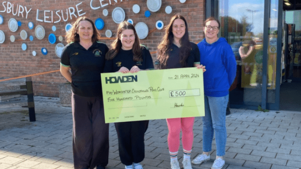 Worcester Crocodiles Water Polo holding a cheque from Howden for £500 as one of our winners