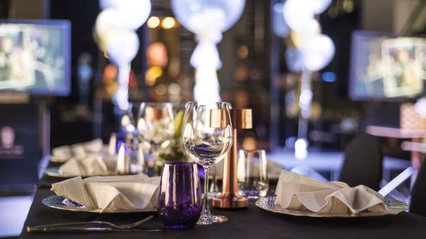 dining table set with wine glasses