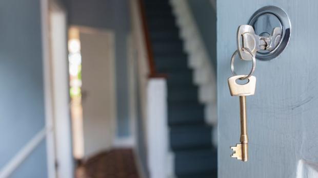 house key in a door lock
