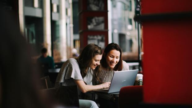 Two women at a laptop | Conveyancers getting applications right first time