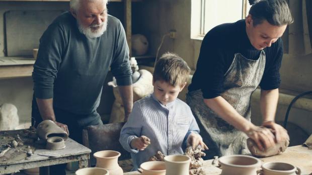 three generations making pottery