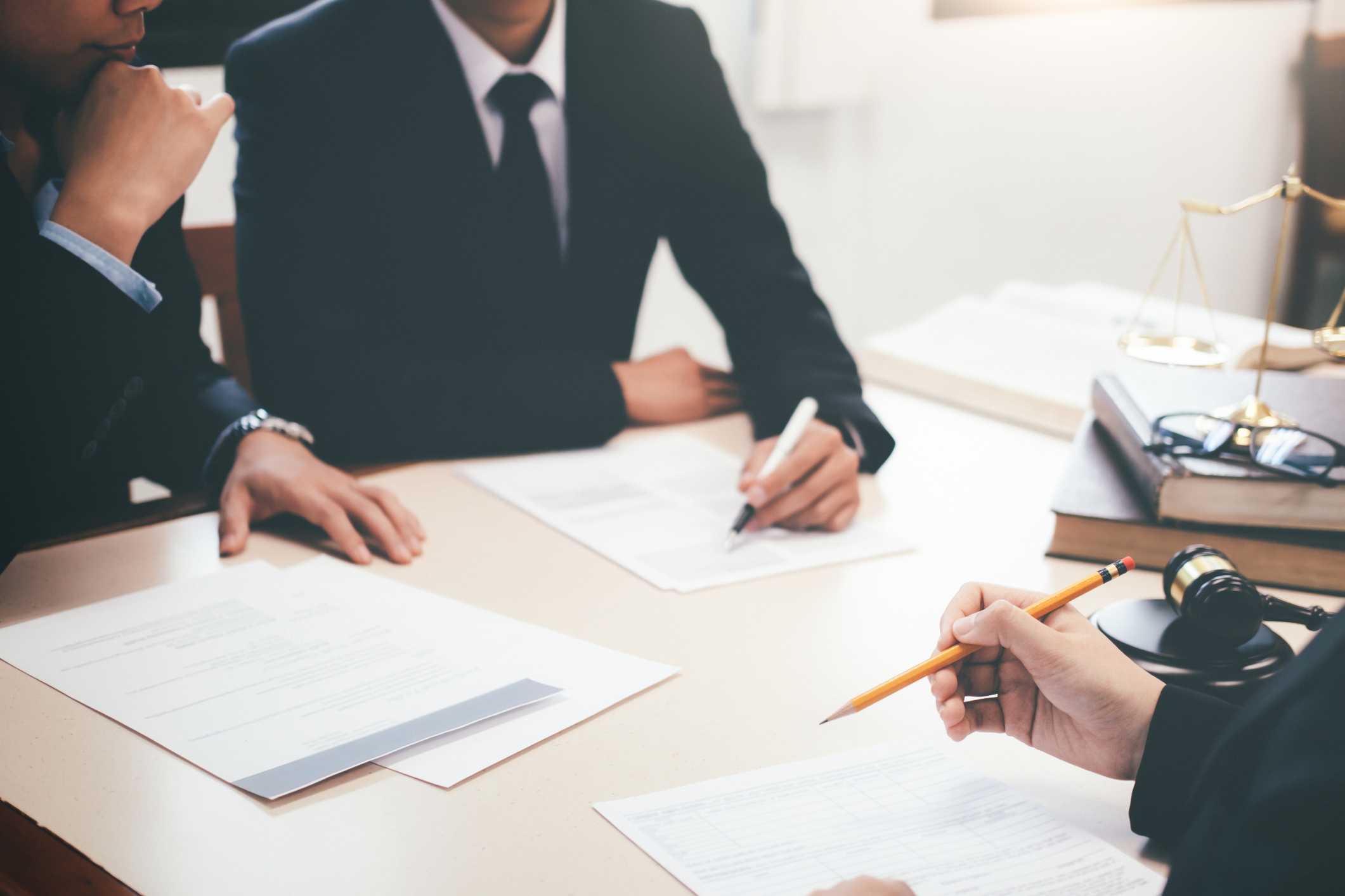 Solicitors signing contracts