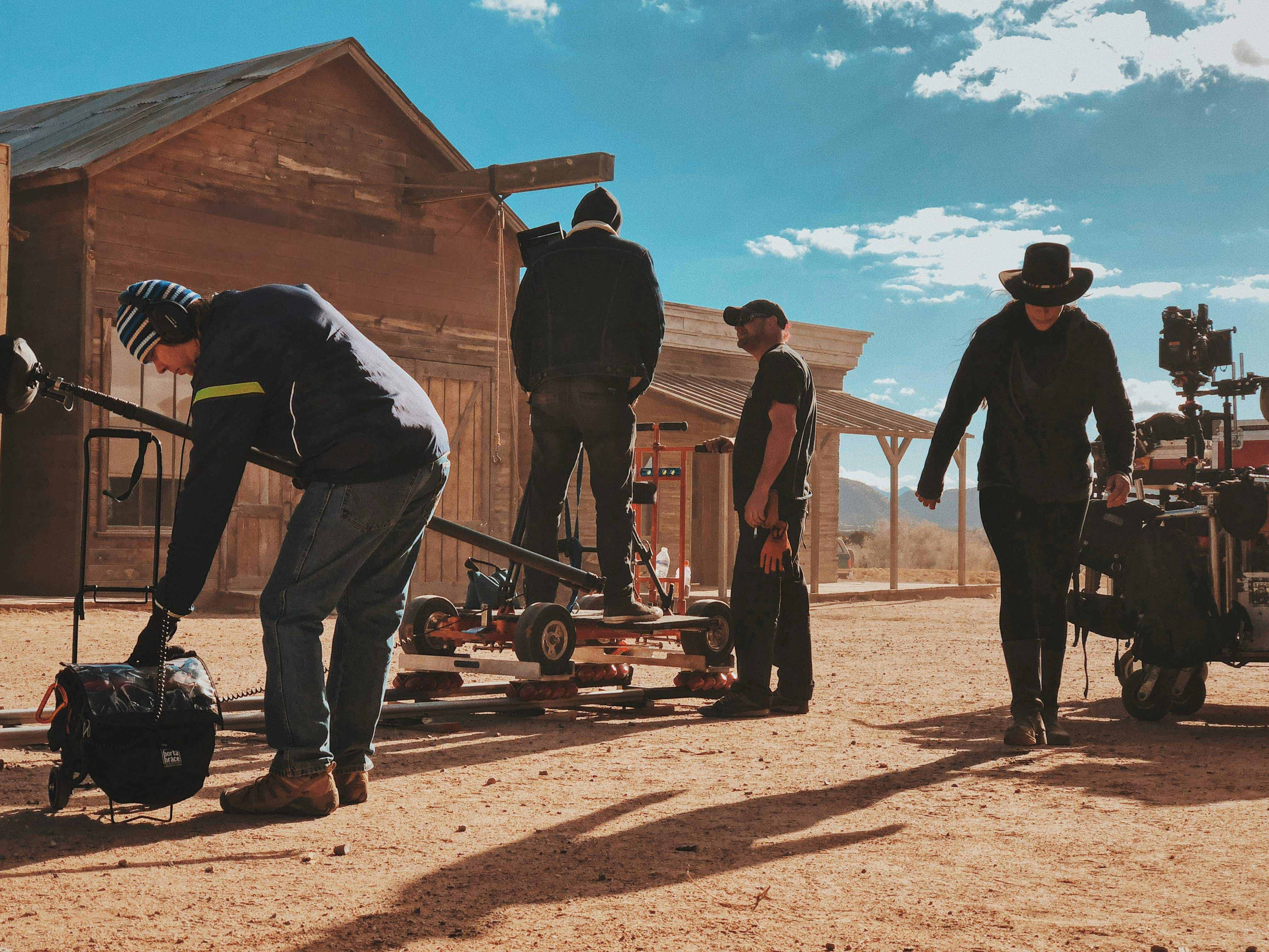 Crew on film set outdoors