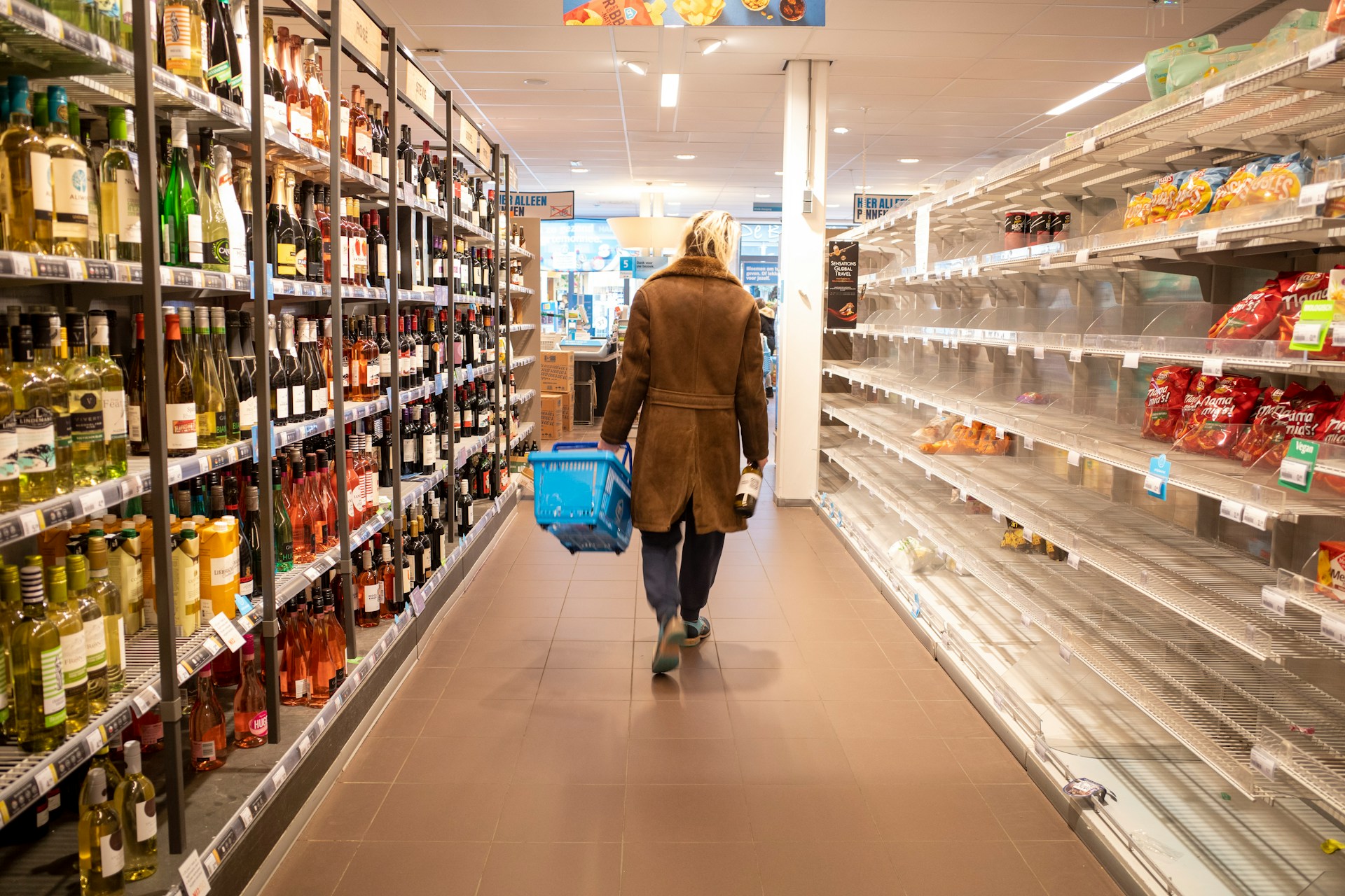 woman walking through a supermarket