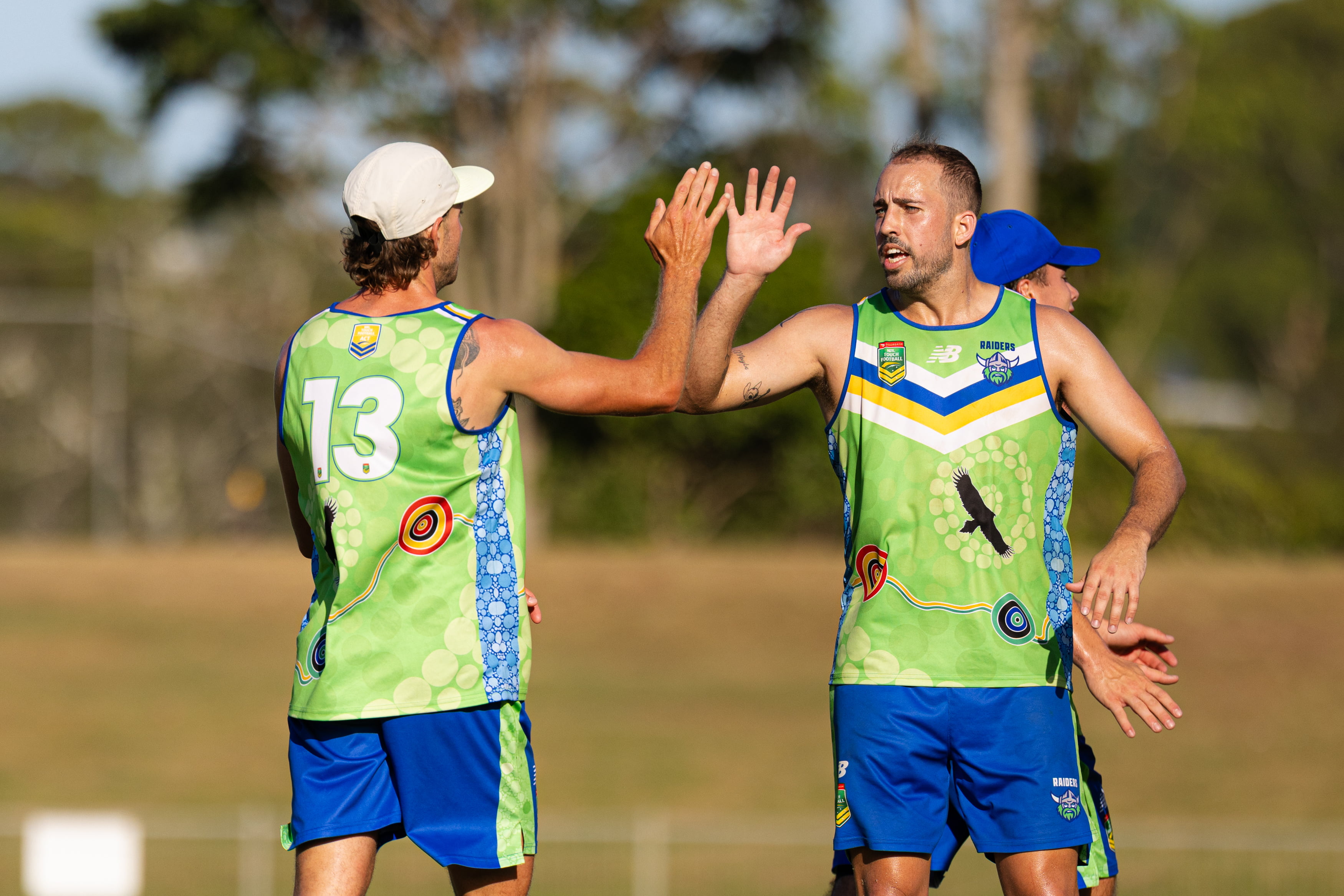 two men playing touch football