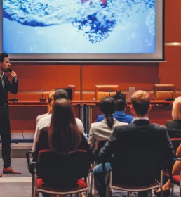 Public speaker at science conference