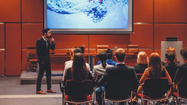 Public speaker at science conference