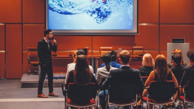 Public speaker at science conference