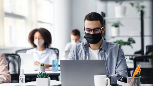 workers with masks on