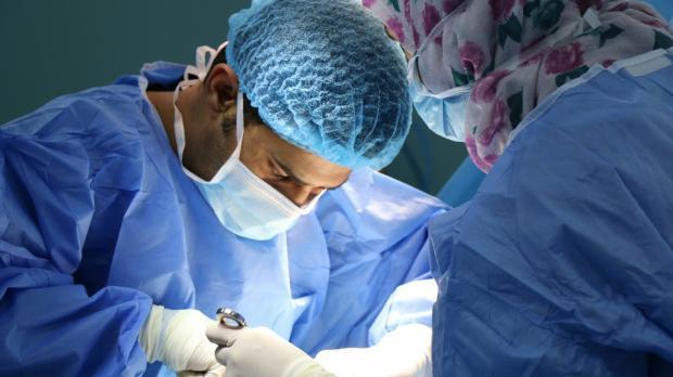 Surgeons performing an operation