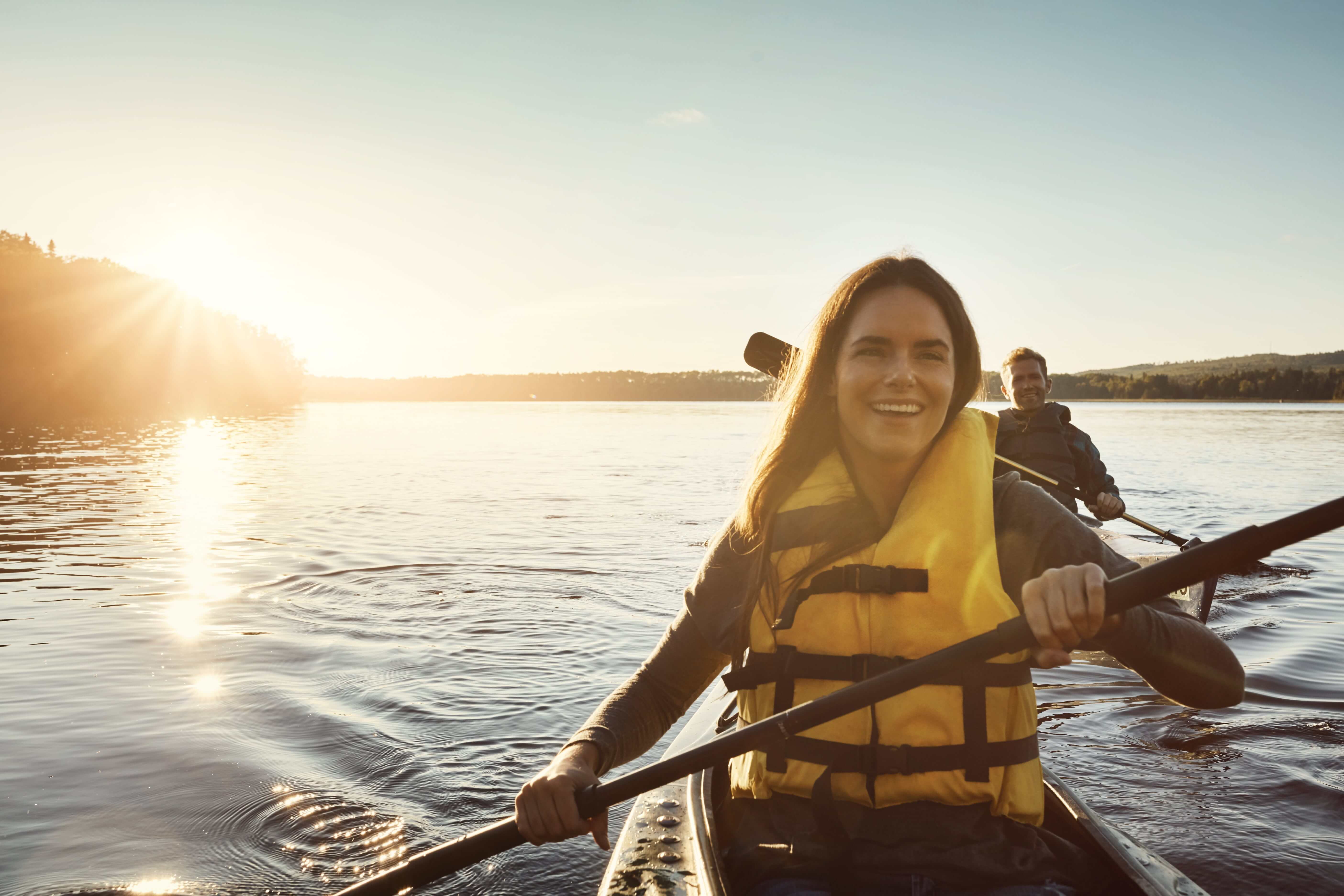 female rowing canoe