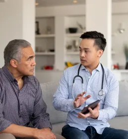 Doctor giving patient his prognosis 
