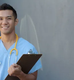 Smiling young male doctor