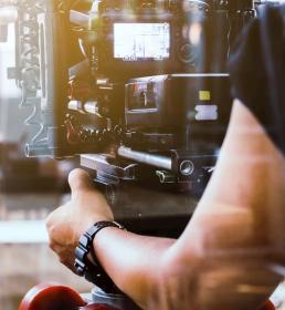 A cameraman operating his camera