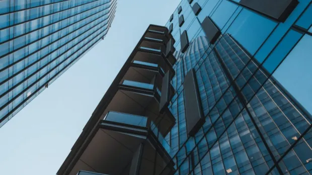 corporate building talk office with glass windows reflecting the opposite building