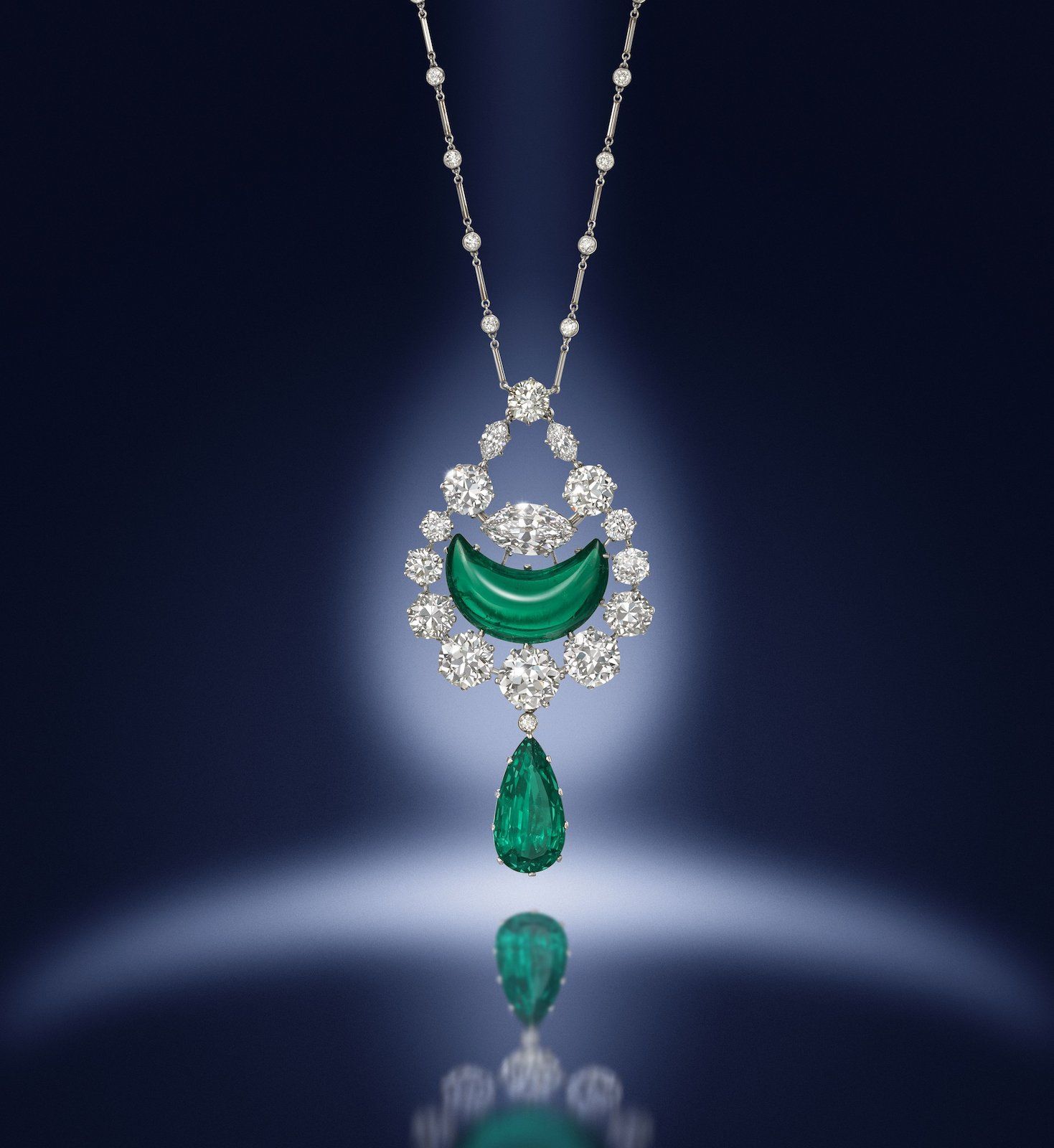 An emerald and diamond pendant/necklace, by the jeweller Hennell