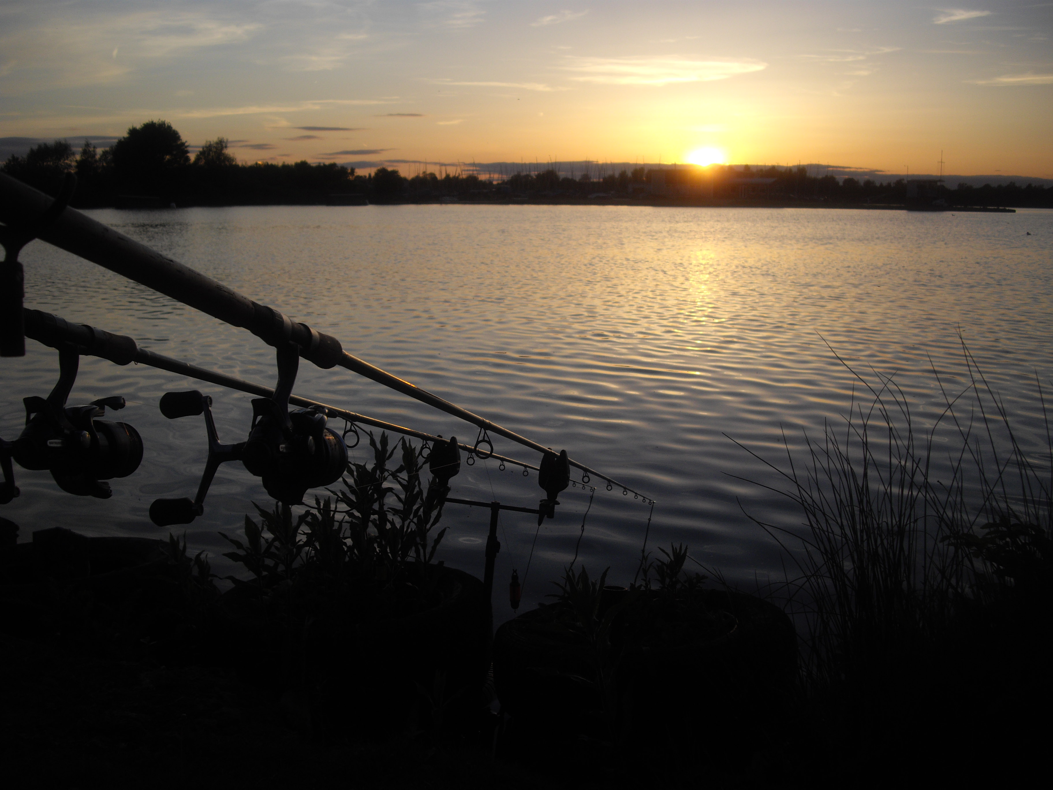 fishing in lake evening sky