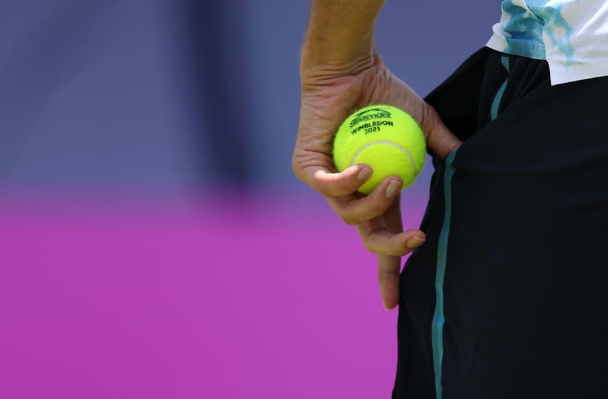 Tennis ball going in pocket