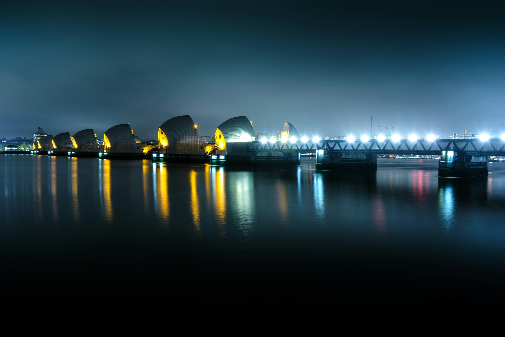 Thames Barrier lit up at night