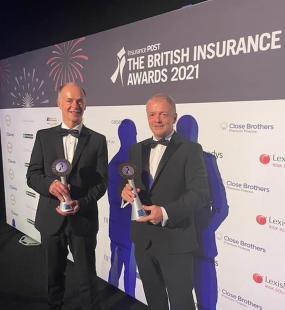 Carl Shuker and Chris Evans picking up a British Insurance Award