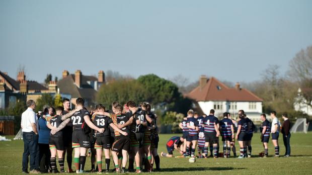 Rugby team pre-match huddle