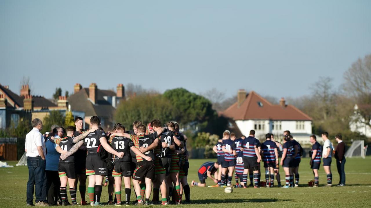 Rugby team pre-match huddle