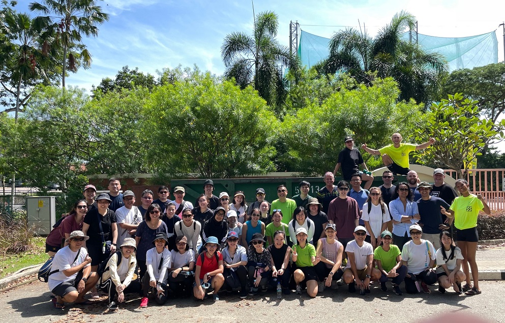 Howden employees group photo at Changi Beach