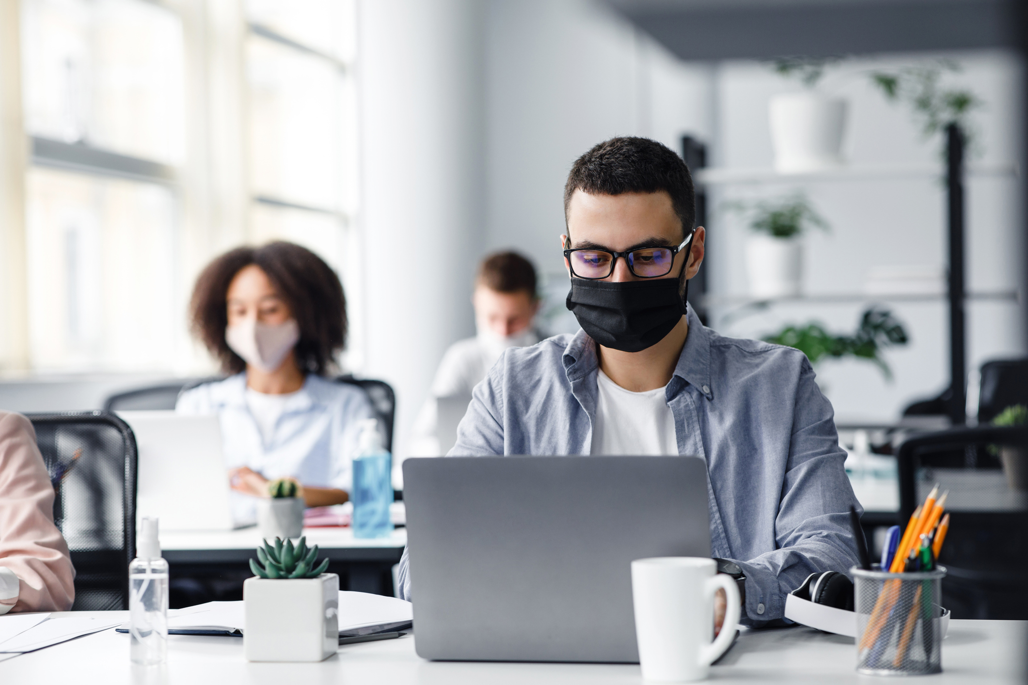office workers with masks on