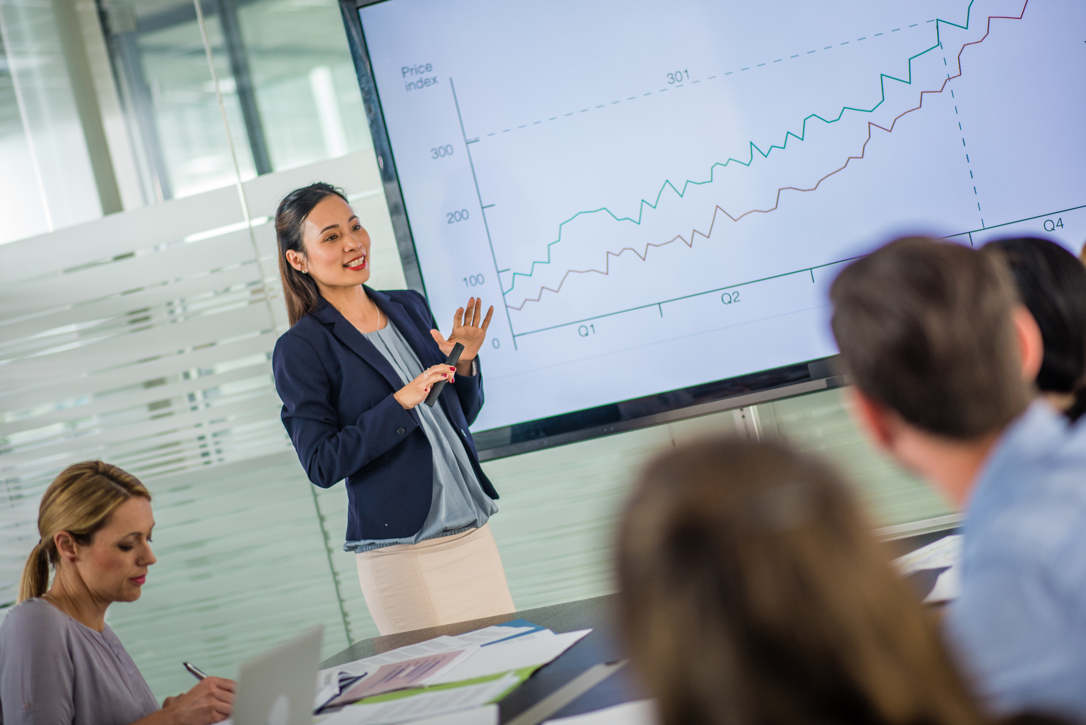 Female broker giving a presentation