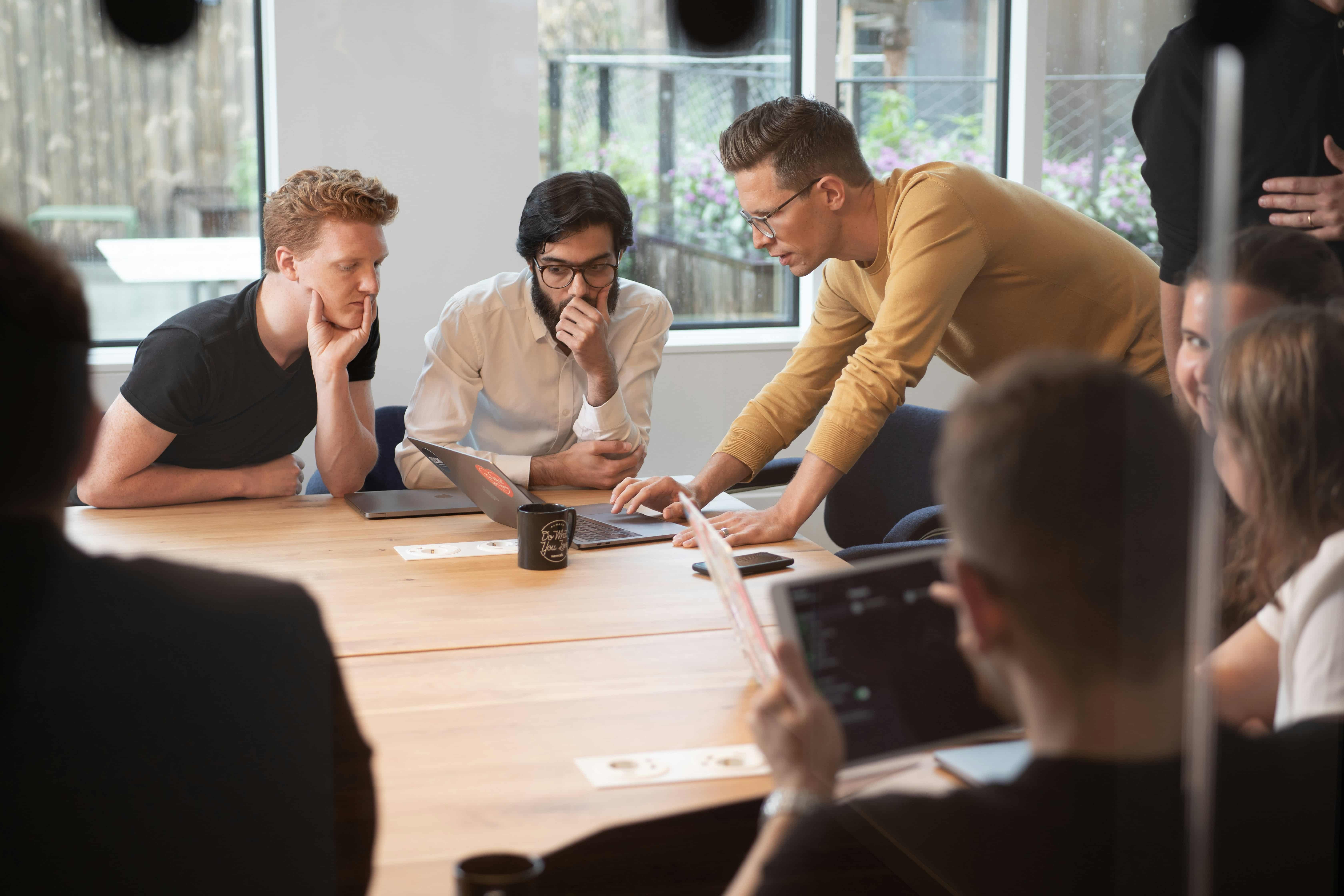 business people talking in workshop