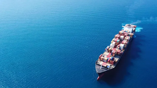 cargo ship with containers in the oceon
