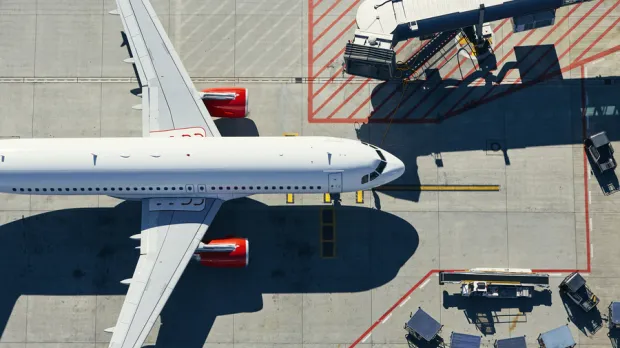 Passenger airplane sitting on airport turf