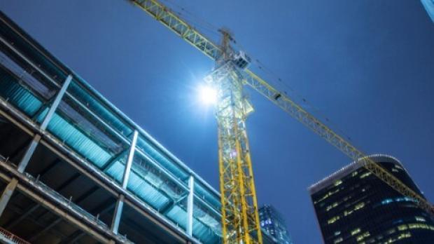 Building under construction with crane