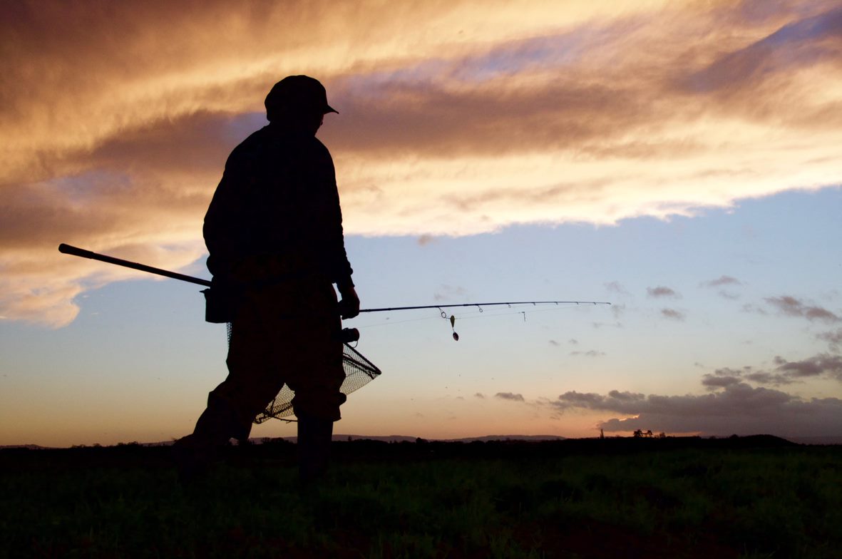 angler silhouette evening sky
