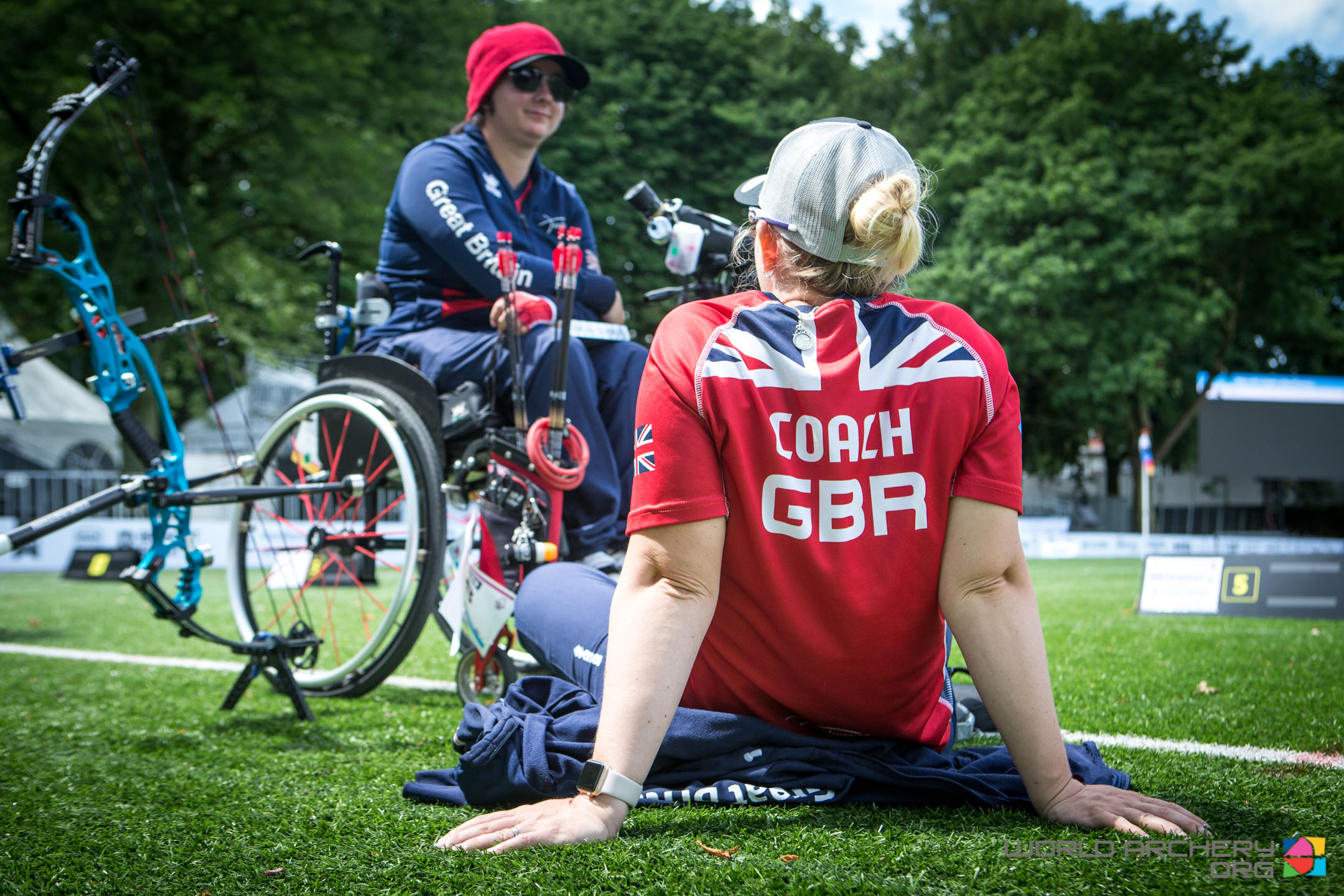 ArcheryGB coach sitting on field