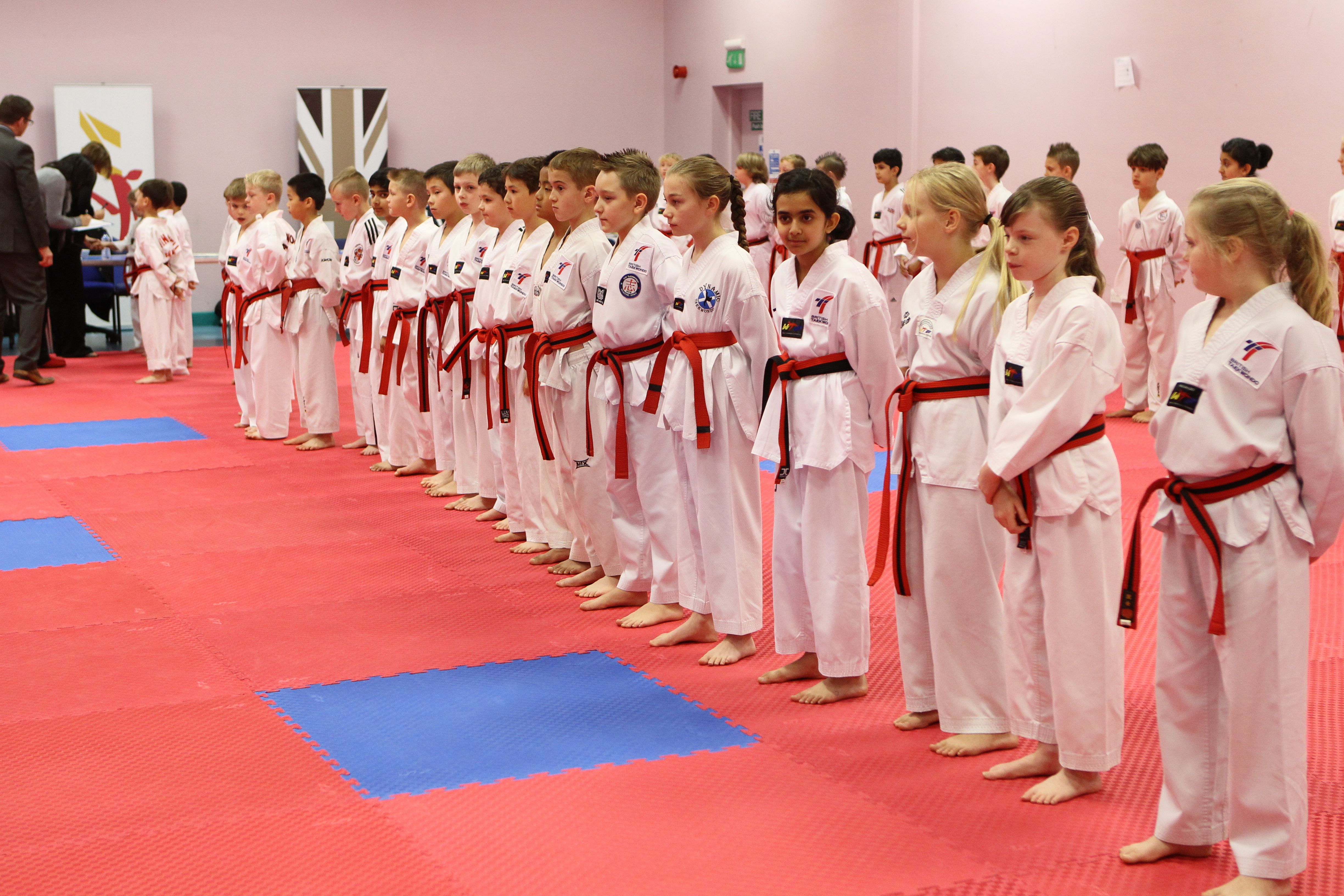 A row of children ready to do Taekwondo