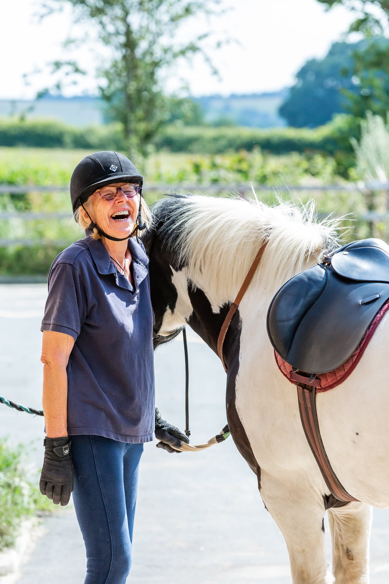 Riding instructor and horse